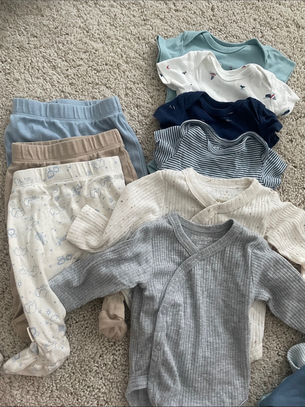 6 onesie shirts and 3 pants